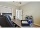 Well-lit home office space with a large desk, comfortable chair, and ample room for productivity at 3907 Elkcam Se Blvd, St Petersburg, FL 33705