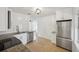 Modern kitchen featuring stainless steel appliances, granite countertops and ample cabinet space at 3915 N Ola Ave, Tampa, FL 33603