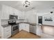 Modern kitchen featuring stainless steel appliances, granite countertops and ample cabinet space at 3915 N Ola Ave, Tampa, FL 33603