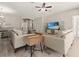 Comfortable living area featuring sleek tile flooring, modern furnishings, and stylish decor for relaxed living at 4421 Larkenheath Dr, Spring Hill, FL 34609