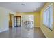 Spacious living area offering tile floors, neutral colors and ample natural light at 4550 Plaza Way, St Pete Beach, FL 33706