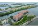 Beautiful waterfront condo building featuring boat slips and stunning views of the bay and surrounding area at 5000 Culbreath Key Way # 9-102, Tampa, FL 33611