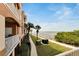 Amazing waterfront view from condo balcony, complete with sidewalks and tropical landscaping at 5000 Culbreath Key Way # 9-102, Tampa, FL 33611