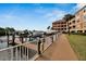 Waterfront property with boat docks along a wooden boardwalk at 5000 Culbreath Key Way # 9-102, Tampa, FL 33611
