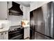Close-up of a modern kitchen with stainless steel appliances, and white subway tile backsplash providing a clean aesthetic at 5000 Culbreath Key Way # 9-102, Tampa, FL 33611