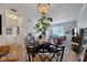Open-concept living room with dining area offering lots of natural light, modern furniture, and elegant decor at 5000 Culbreath Key Way # 9-102, Tampa, FL 33611
