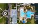 Aerial view of the community pool area, featuring a pool, lounging area, and lush landscaping at 5229 Brighton Shore Dr, Apollo Beach, FL 33572