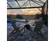 Outdoor living space with covered patio, pool, and lush landscaping, perfect for entertaining at 5317 Del Coronado Dr, Apollo Beach, FL 33572