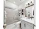 Beautiful bathroom featuring a glass enclosed shower, gray vanity, and modern fixtures at 5317 Del Coronado Dr, Apollo Beach, FL 33572