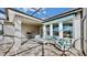 Covered lanai featuring brick floors, ceiling fan and ample seating with decorative pillows at 5317 Del Coronado Dr, Apollo Beach, FL 33572