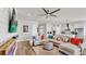 Open concept living room with views of the kitchen and dining at 5317 Del Coronado Dr, Apollo Beach, FL 33572
