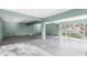 Spacious unfinished basement with concrete floors and support beams ready for customization at 6841 Oelsner St, New Port Richey, FL 34652