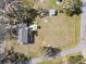An aerial view reveals this property's large lot, home, and landscaping at 11124 Corlett Rd, Riverview, FL 33578