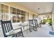Charming porch with rocking chairs at 11124 Corlett Rd, Riverview, FL 33578
