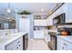 Bright kitchen with white cabinets, modern appliances, and a functional layout at 1168 Emerald Hill Way, Valrico, FL 33594