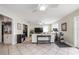 Bright, open-concept living area offering a peek into the kitchen and dining room at 1209 E Idlewild Ave, Tampa, FL 33604