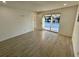 Bedroom featuring tile floors, white walls, and sliding glass doors leading to the pool at 1324 51St Ne Ave, St Petersburg, FL 33703