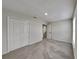 An empty bedroom featuring carpet and a closet at 13506 Copper Head Dr, Riverview, FL 33569