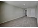 An empty bedroom featuring carpet and two closets at 13506 Copper Head Dr, Riverview, FL 33569