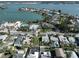 An aerial view of the property showing close proximity to bay access and beautiful landscaping at 15548 1St E St, Redington Beach, FL 33708