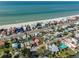 Aerial view of a house next to the beach with clear ocean views at 15548 1St E St, Redington Beach, FL 33708