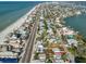 An aerial view of the property showing close proximity to beach and bay access at 15548 1St E St, Redington Beach, FL 33708