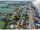 Aerial shot of coastal home with a nearby waterfront, ocean and beach access at 15548 1St E St, Redington Beach, FL 33708