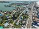 Aerial perspective of a coastal home near a beautiful waterfront and beaches at 15548 1St E St, Redington Beach, FL 33708