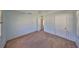 A bedroom featuring hardwood floors, neutral paint, and a ceiling fan at 15548 1St E St, Redington Beach, FL 33708