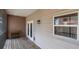 Balcony features a convenient furniture and a double-door access to the house at 219 126Th Ave, Treasure Island, FL 33706