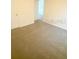 Room with tan carpet at 2714 Lotus Flower Trl, Wesley Chapel, FL 33543