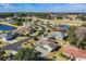 Serene neighborhood aerial view with access to golf course, lake, and beautifully manicured yards at 29307 Schinnecock Hills Ln, San Antonio, FL 33576