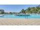 Large community pool featuring a central fountain and plenty of space to swim and relax at 29307 Schinnecock Hills Ln, San Antonio, FL 33576