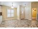 Inviting entryway boasting stylish wood-look floors, a large window, and fresh, neutral paint at 29307 Schinnecock Hills Ln, San Antonio, FL 33576