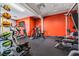 Well-equipped gym with treadmills, elliptical machines, and various fitness equipment for a complete workout at 29307 Schinnecock Hills Ln, San Antonio, FL 33576