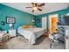 Bright bedroom with colorful walls and a ceiling fan at 2983 Bonaventure Cir # 204, Palm Harbor, FL 34684