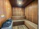 An indoor sauna with wooden benches, perfect for relaxation and unwinding after a long day at 2983 Bonaventure Cir # 204, Palm Harbor, FL 34684