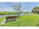 Scenic view of a pond with a fountain and a bench to sit and enjoy the day at 2983 Bonaventure Cir # 204, Palm Harbor, FL 34684