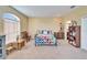 Expansive bedroom featuring light carpet, natural light, and decorative accents at 3822 Salida Delsol Dr, Sun City Center, FL 33573