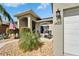 Charming home featuring a manicured yard with a cozy seating area and decorative rock landscaping at 3822 Salida Delsol Dr, Sun City Center, FL 33573