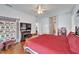 Inviting main bedroom featuring a ceiling fan, fireplace and access to a private bathroom at 3822 Salida Delsol Dr, Sun City Center, FL 33573