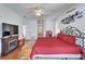 Spacious main bedroom features a fireplace, ceiling fan, and modern decor at 3822 Salida Delsol Dr, Sun City Center, FL 33573