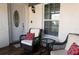 Cozy front porch with comfortable seating, perfect for enjoying the outdoors at 3942 La Costa Ln, Largo, FL 33771