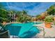 Resort-style pool area with ample lounge chairs, lush landscaping, and inviting gazebo at 4207 S Dale Mabry Hwy # 6207, Tampa, FL 33611