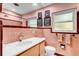 Bathroom featuring pink tile and a new sink at 472 Pine St, Tarpon Springs, FL 34689