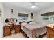 Bedroom with carpet and a window with blinds at 472 Pine St, Tarpon Springs, FL 34689