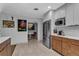 Kitchen area showcasing stainless steel appliances and access to the dining area at 472 Pine St, Tarpon Springs, FL 34689