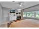 Comfortable main bedroom offering terrazzo flooring, natural light, and ample closet space at 472 Pine St, Tarpon Springs, FL 34689