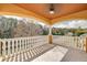 Home's balcony overlooking a treed area at 4873 Quill Ct, Palm Harbor, FL 34685