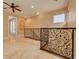 Bright upper hallway with decorative railings offering a unique architectural feature at 4873 Quill Ct, Palm Harbor, FL 34685